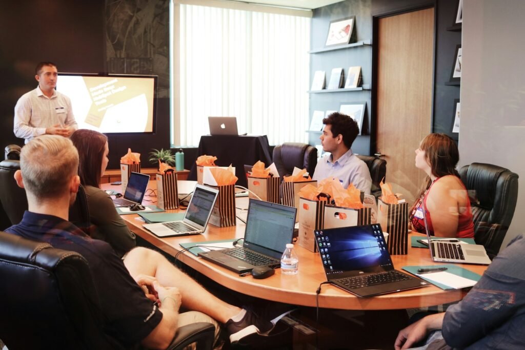 Marketing team reviewing a campaign plan around a table