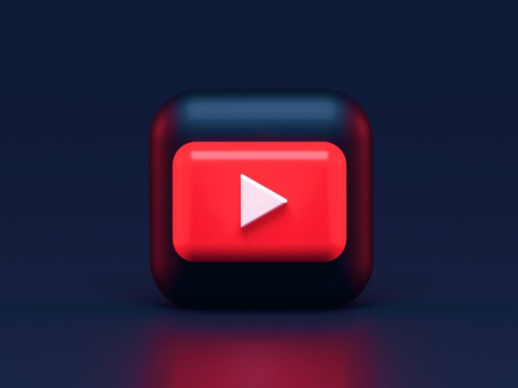 Red play button icon on a dark blue background
